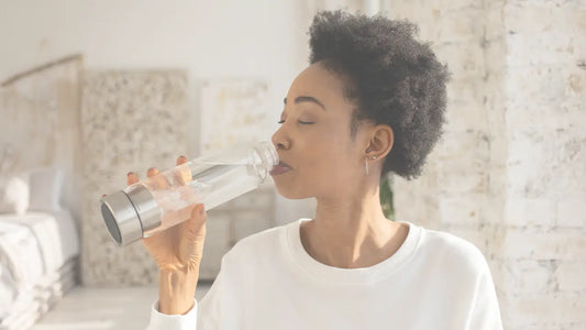 lady hydrating with water